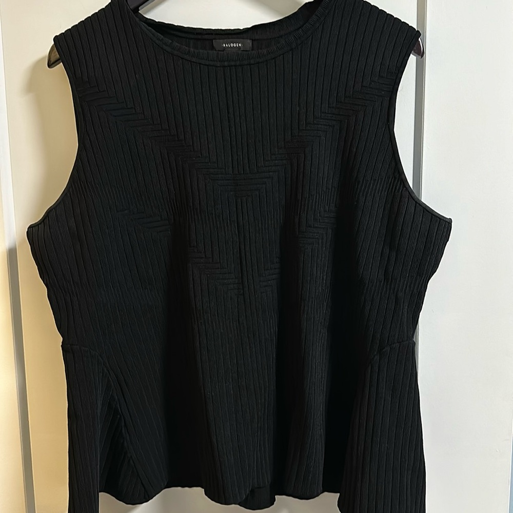Black peplum sleeveless top